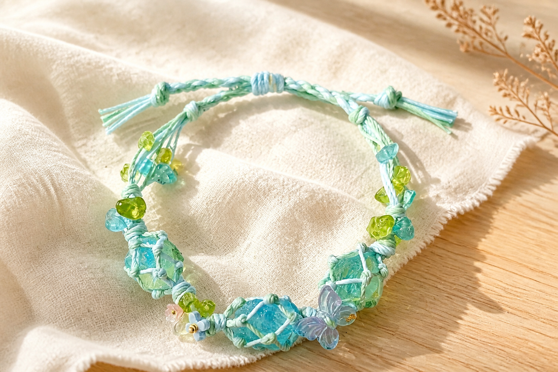 Aqua and lime beaded macrame bracelet styled on ivory linen and natural wood in warm morning light