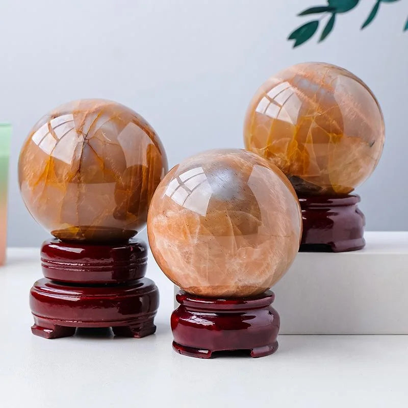 Orange Moonstone Crystal Sphere — crystal home decor, lifestyle view
